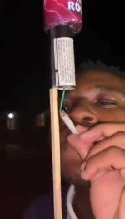 WCGW trying to lit a firework with a cigarette