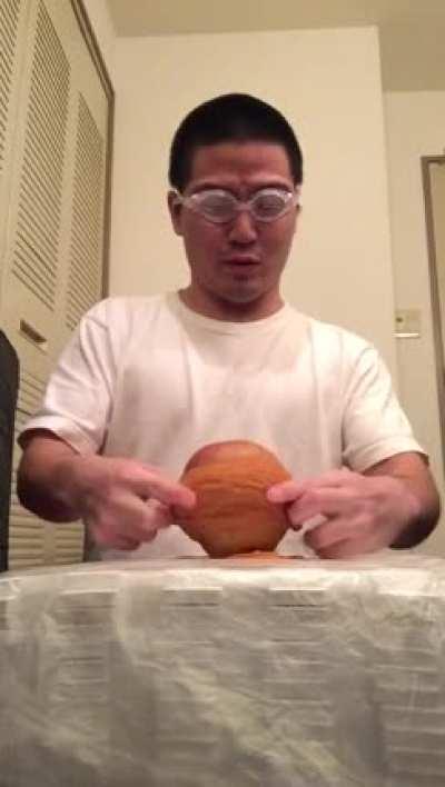 Putting rubber bands on an apple