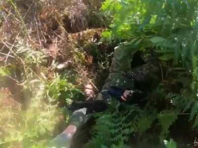 So my friend decided to pick up my M249… by the trigger.