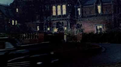 Clue (1985) - Car drives by a blue/green-screened element