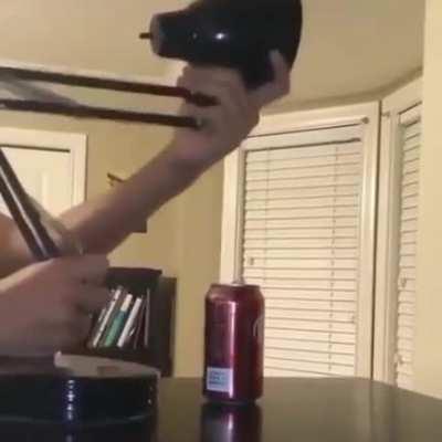 To break a soda can