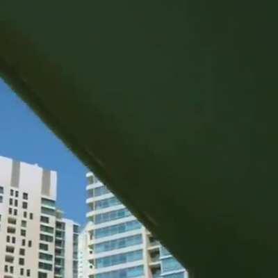 Zip-lining without safety harness.