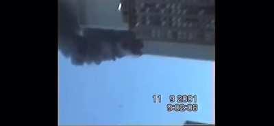 Rare angle of the first plane hitting the WTC on 9/11/01 as seen from the Hugh Carey Tunnel in Brooklyn