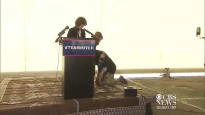 Mitch McConnell falls leaving the Senate Chamber today