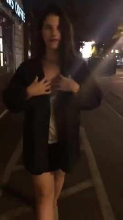 She flashes her tits, then realizes a car just drove past