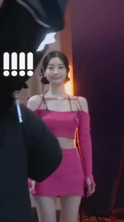 Dahyun in pink making her trademark (*¯︶¯*) face