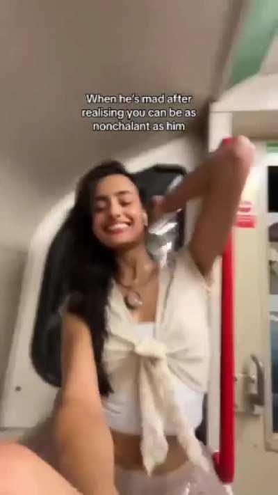 A nonchalant person would not do this but hey she's having a good time