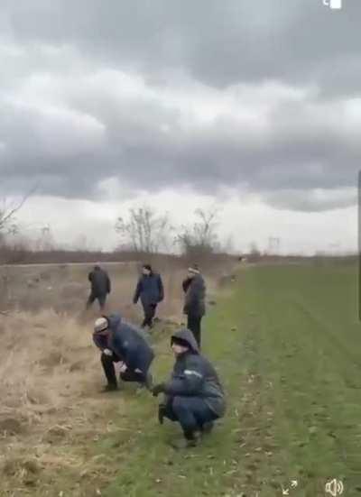 Ukrainians keep on singing national anthem while being shot! They're fearless! On the 30th second you can see a leg of an innocent man being torn off by a grenade thrown by russist! What kind of creature you have to be to perform such actions???