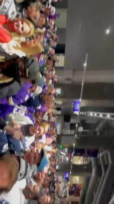 Cowboys chant at the bank