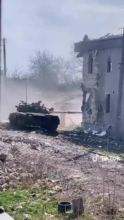 A Ukrainian T-80U tank of the 93rd Brigade fires at Russian positions in Bakhmut.
