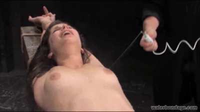 Bobbi Starr tied down and fucked by a machine and water jets