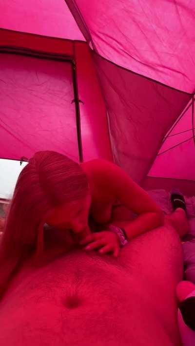 Blowing someone else at a music festival 