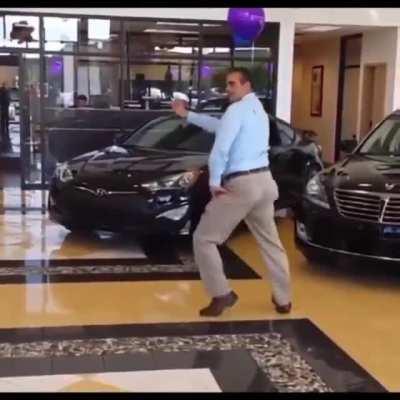 Car salesman vibing