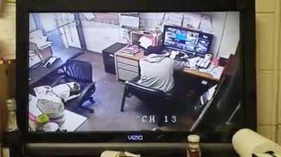 Dog pushes chair to take a seat next to his human friend