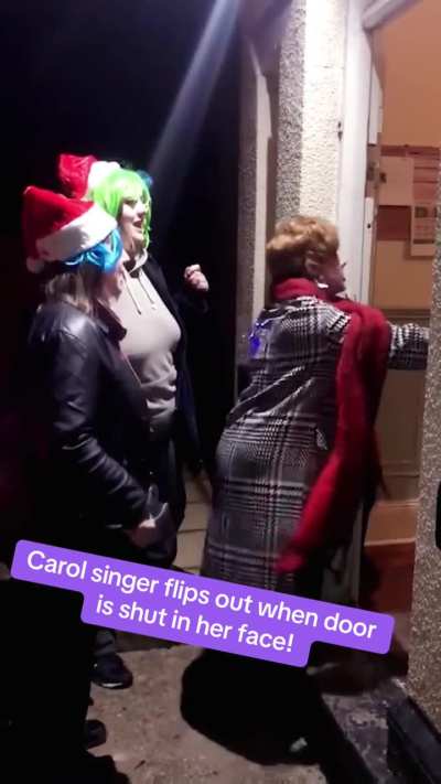 Caroler freaks out when door is shut in face 