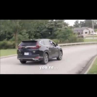 A white man holds a ‘Black Lives Matter’ sign in Arkansas. This is the response he gets.