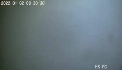 Explosion after the woman throws the parcel