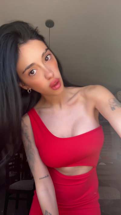 Ever loved a doll in a red dress ?