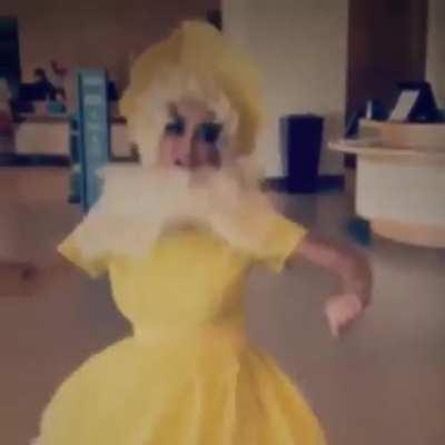 This yellow dress suits her I must say