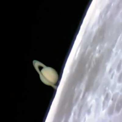 Incredible footage of Saturn rising from behind the Moon during a lunar occultation, captured from a ground-based telescope