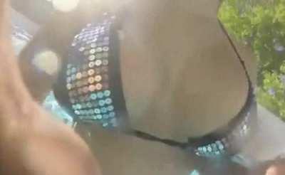 Between Zelina's boobs