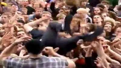 daron goes crowdsurfing (deer dance, rock am ring 02)
