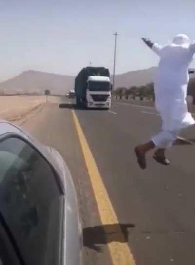 Jumping in front of a truck