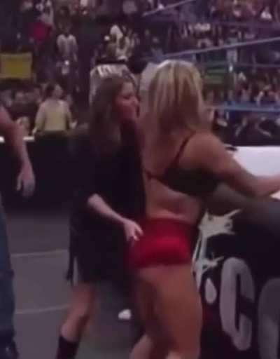 Stephanie McMahon grabs tori’s ass