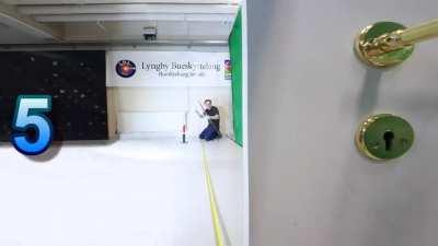 Lars Andersen, perhaps the greatest archer of the 21st century, shoots 7 arrows through a keyhole.