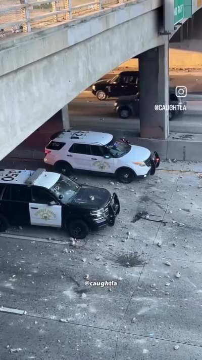 LA protesters are stoning LA police cars