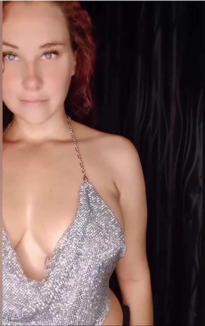 A surprise awaits from this redheaded natural titty girl next door 😉