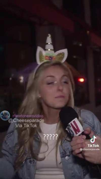 Fake Halloween reporter goes around interviewing people in costume