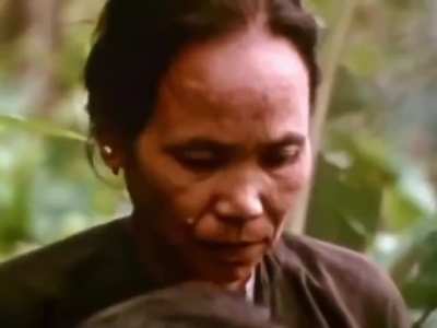 US soldiers burning down a home in Vietnam