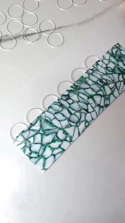 Creating earrings from polymer clay.