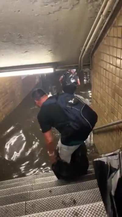 Trying to stay dry in the NYC subway