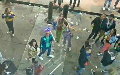woman flashing boobs for beads at mardi gras on earthcam