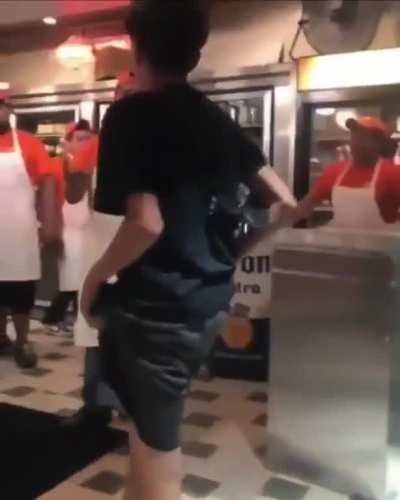 Kid tries fighting store employee while screaming the N word