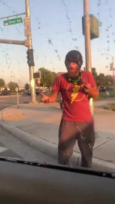 Throwing a drink at drivers