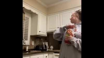 Shaking a ketchup bottle