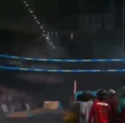 JFK decending from the sky as a crowd of Qanon supporters gather at Dealy Plaza (Circa 2021)