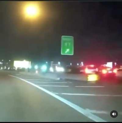 [USA] Crossing solid lines, nearly PIT maneuvering a cop because next exit is too far