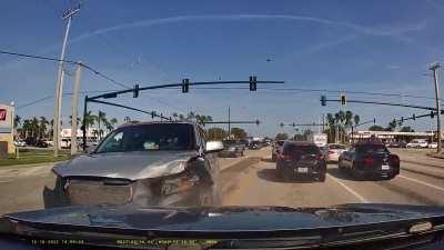 Florida Man cracks windshield with forehead while driving into stopped traffic on the other side of an intersection.