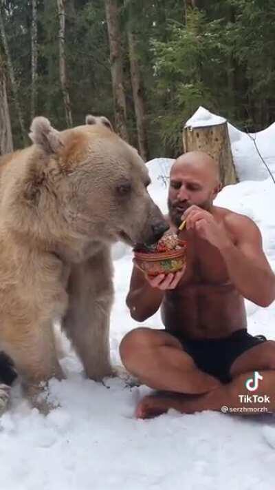 Feeding a bear his breakfast