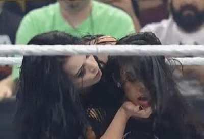 Paige with a goodnight kiss for AJ