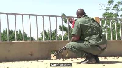 The credible Malian Army exchanging cigarettes and arguing with each other while exposed to enemy fire