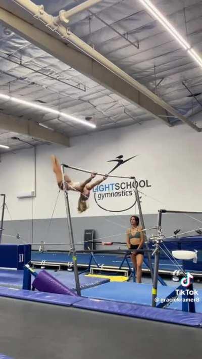 Stunt woman trains with gymnast