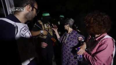 Video of Hamas handing over the 2 Israeli hostages
