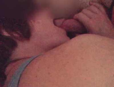 Playing with his small softy