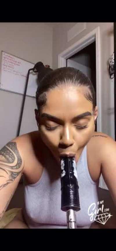 Sucking cream off dildo