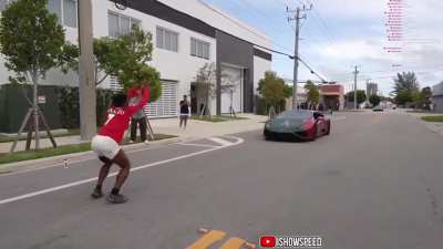 IShowSpeed jumps over 2 cars on livestream